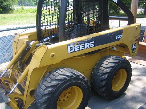 john deere 320 skid steer hydraulic oil capacity|john deere 320 skid steer weight.